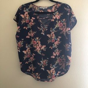navy floral blouse with rib cage detailing